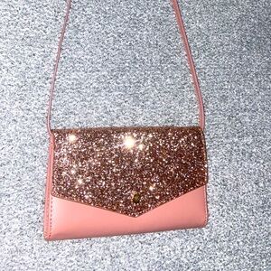 Over the shoulder rose, gold sequel purse